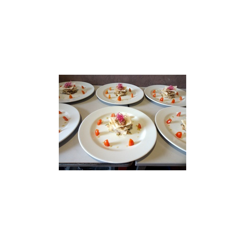 Mille feuille de tartare de courgettes et parmesan en vinaigrette balsamique